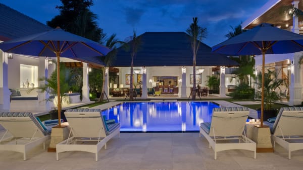 Villa Windu Asri - Pool and dining pavilion at night